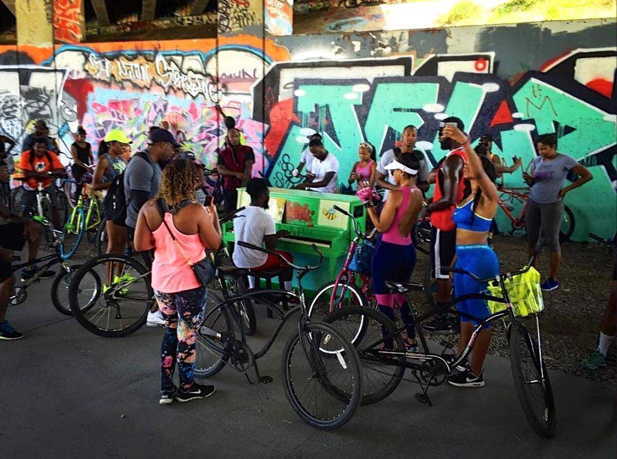 Play music on painted pianos at Camp North End, on the Queens University Campus and uptown.