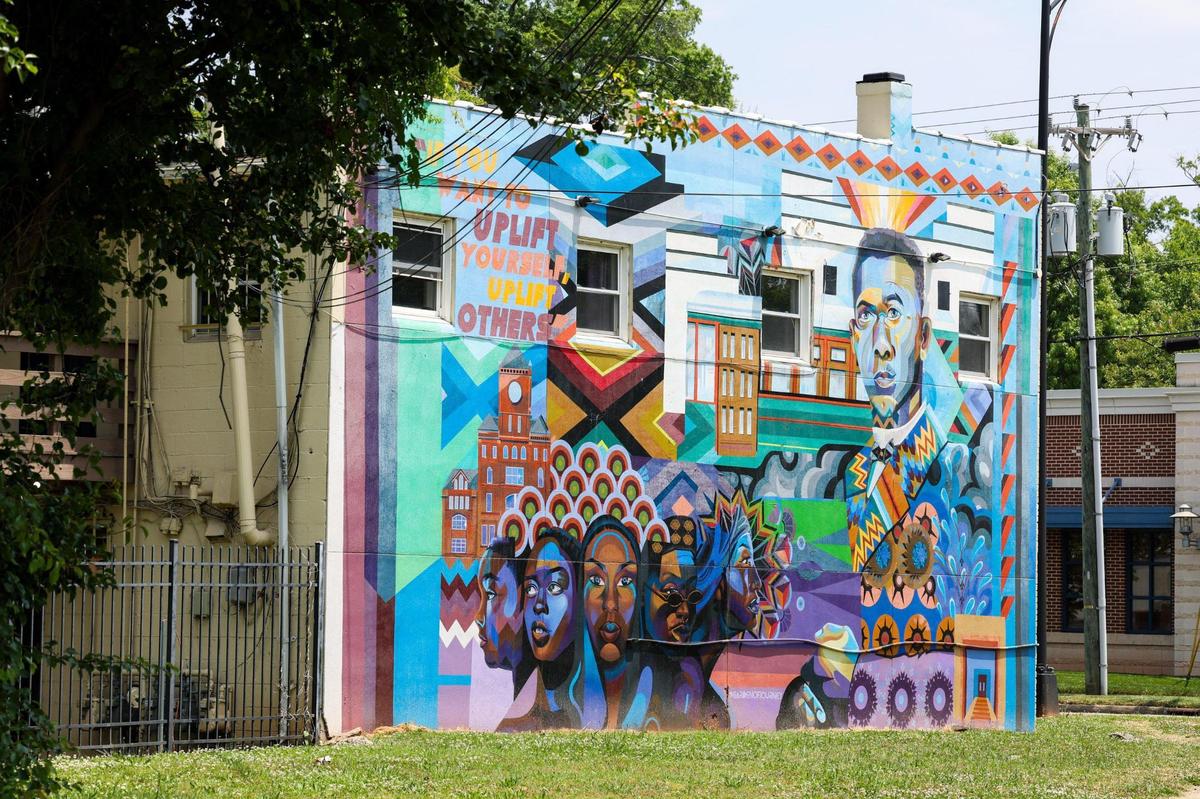A mural on Beatties Ford Road that pays homage to Booker T. Washington is a favorite landmark of longtime Washington Heights resident Mattie Marshall’s.