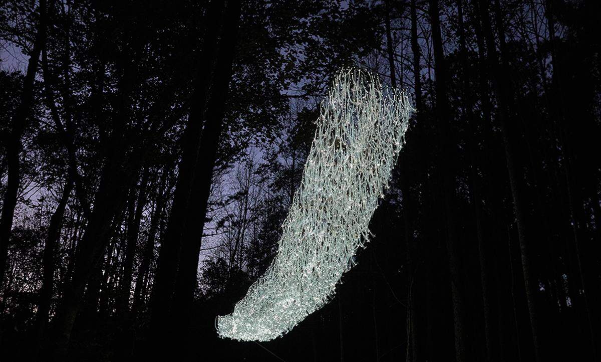 This work, titled “Moss,” is 60-feet long, and 8-fee wide. It consists of 3,000 bulbs and more than 126,000 strands of fiber optic filaments. “I worked with a lighting fabricator to design the lighted/netting structure before my team and I hand-attached the fiber optics to each of the bulbs,” said artist Meredith Connelly. It’s inspired by the delicate structure of Spanish moss.