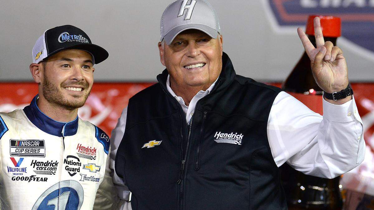 NASCAR driver Kyle Larson (left) and team owner Rick Hendrick celebrate winning the Coca-Cola 600 at Charlotte Motor Speedway in Concord on Sunday.