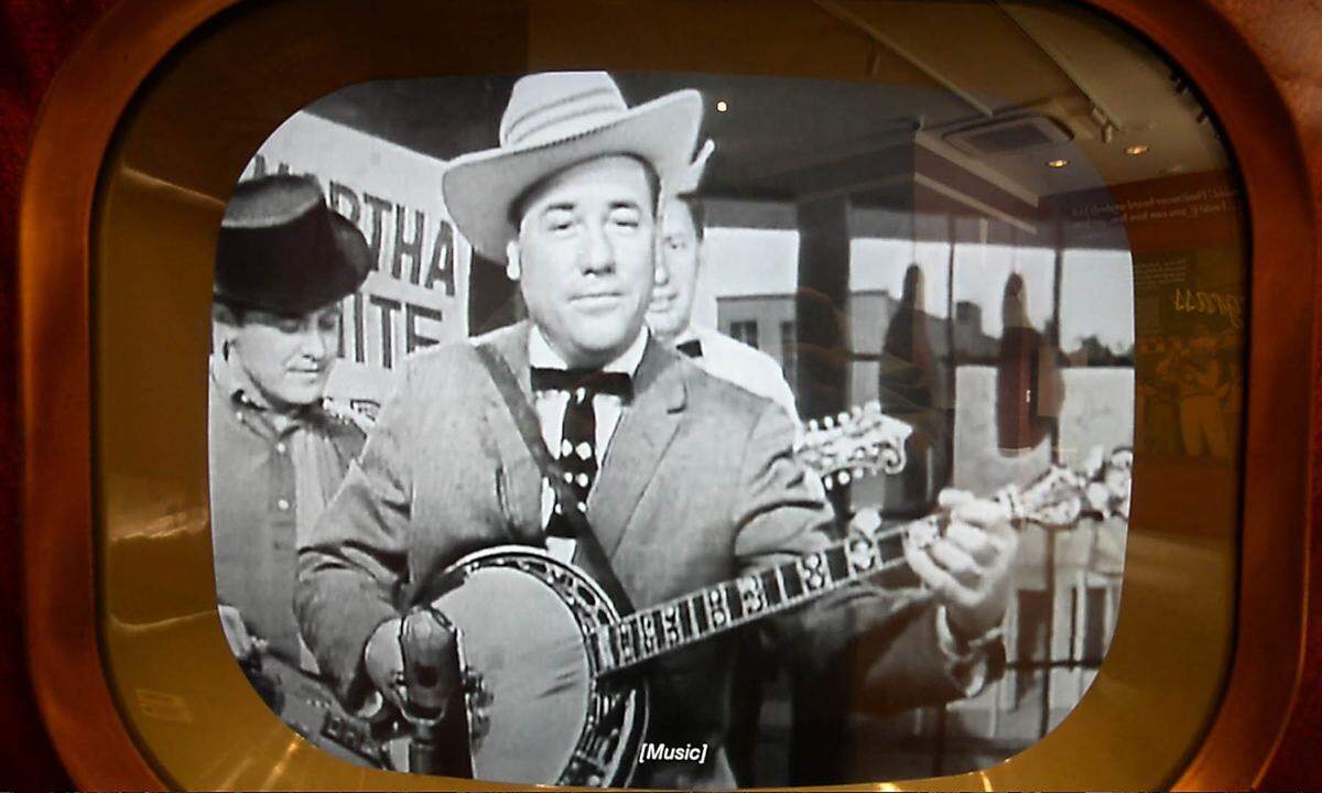 Vintage footage of Earl Scruggs is displayed on an old televison at the Earl Scruggs Center in Shelby Friday, January 3, 2014. The museum will open Saturday, January 11, with a grand opening celebration featuring old-fashioned games, music and entertainment.