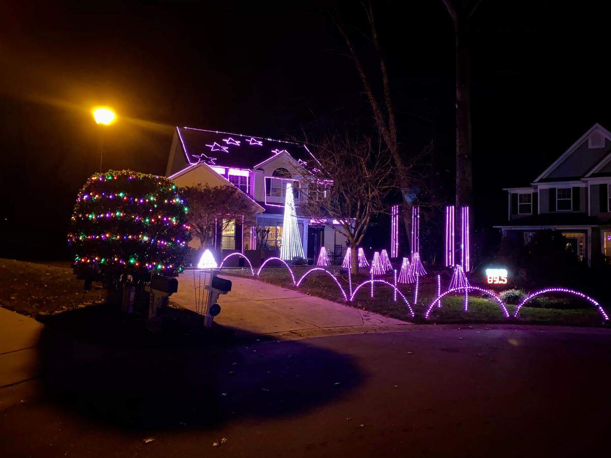 Bob Hlastala has turned his Huntersville home into a full-on show, with lights dancing to the music of a private radio station that you play in your car.