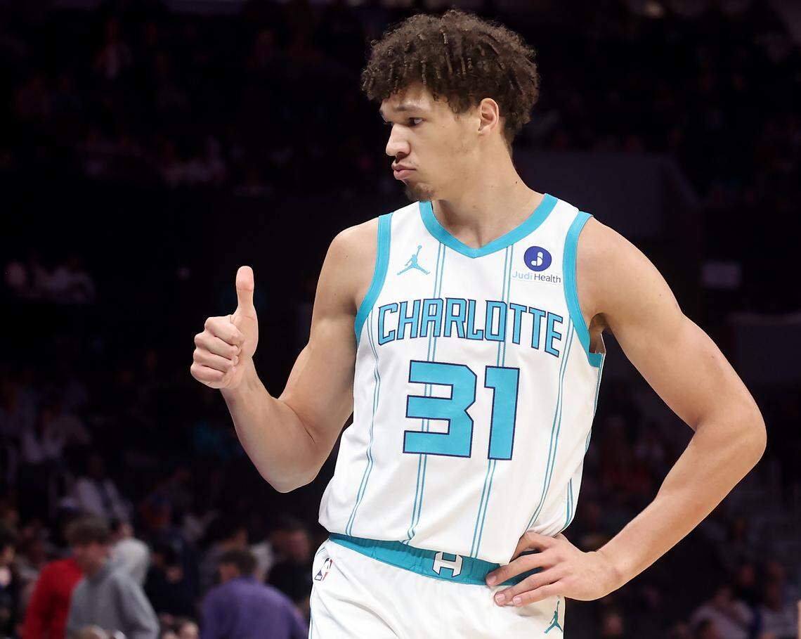 Charlotte Hornets forward Tidjane Salaün gives the thumbs- up to the bench during action against the Denver Nuggets at Spectrum Center in Charlotte, North Carolina, on Sunday, Dec. 7, 2025.