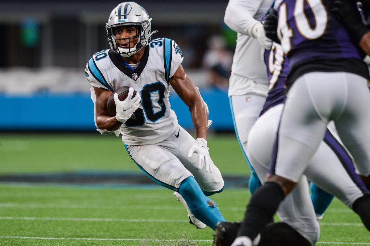 Panthers running back Chuba Hubbard runs the ball during the pre-season game against the Ravens on Saturday, August 21, 2021 at Bank of America Stadium.