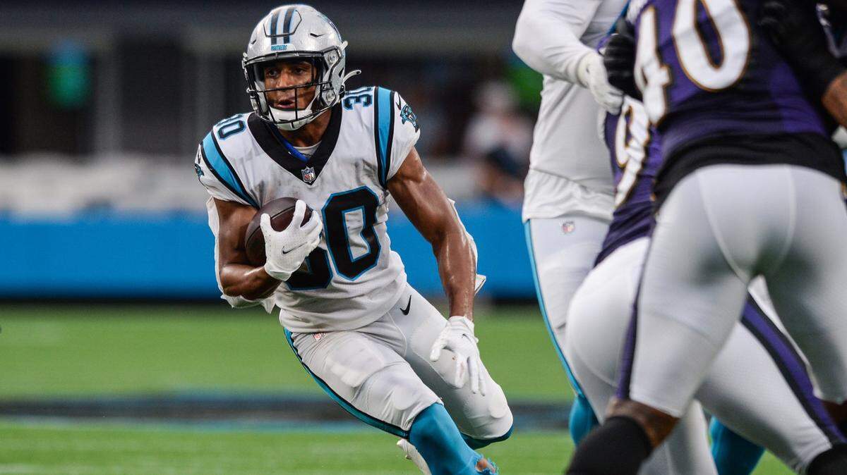 Panthers running back Chuba Hubbard runs the ball during the preseason game against the Baltimore Ravens.