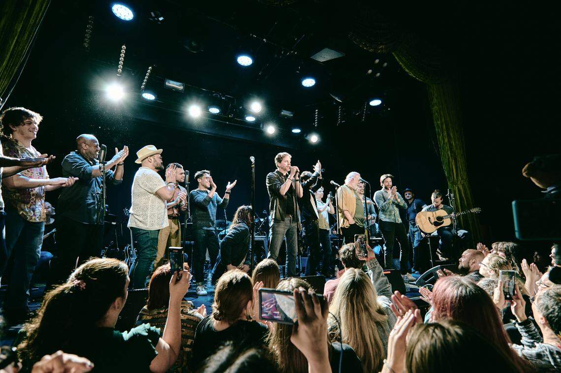 “Cast members of The Avett Brothers musical “Swept Away” perform at a sold-out reunion concert in New York City on April 28, four months after the show ended its abbreviated Broadway run,