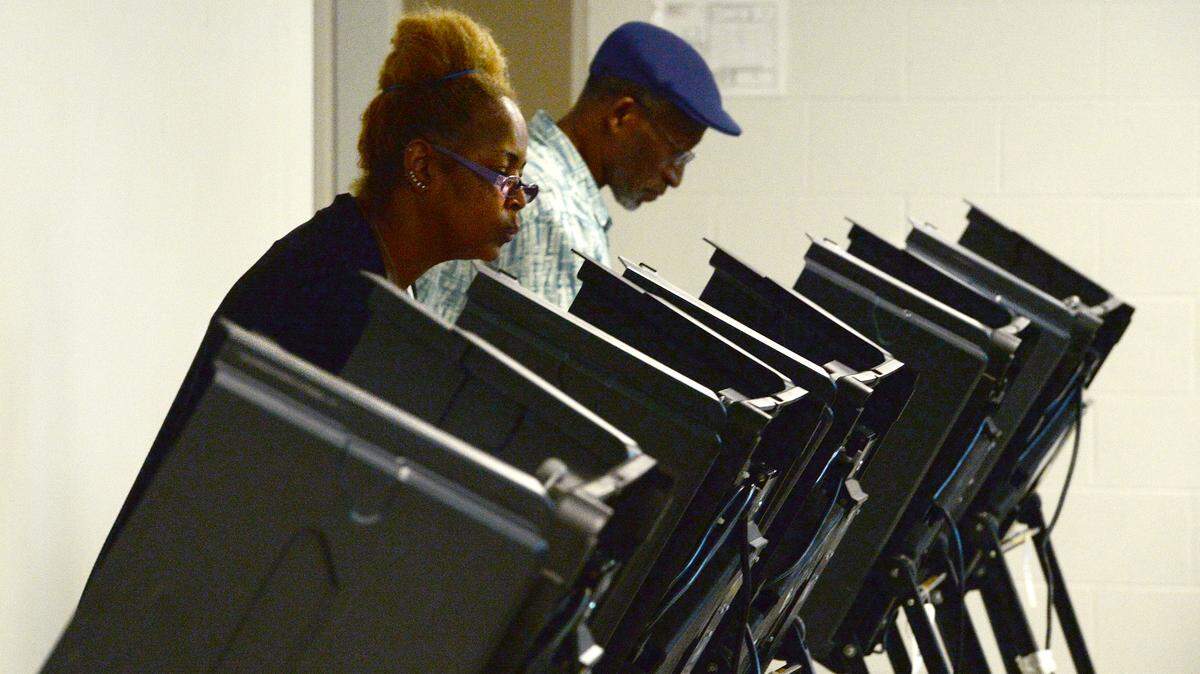 Charlotte residents Tanya Archie-Younge, and her husband, Jesse Younge, cast their ballots in September 2019 at the West Charlotte Recreation Center. They were voting in the 9th District primary.