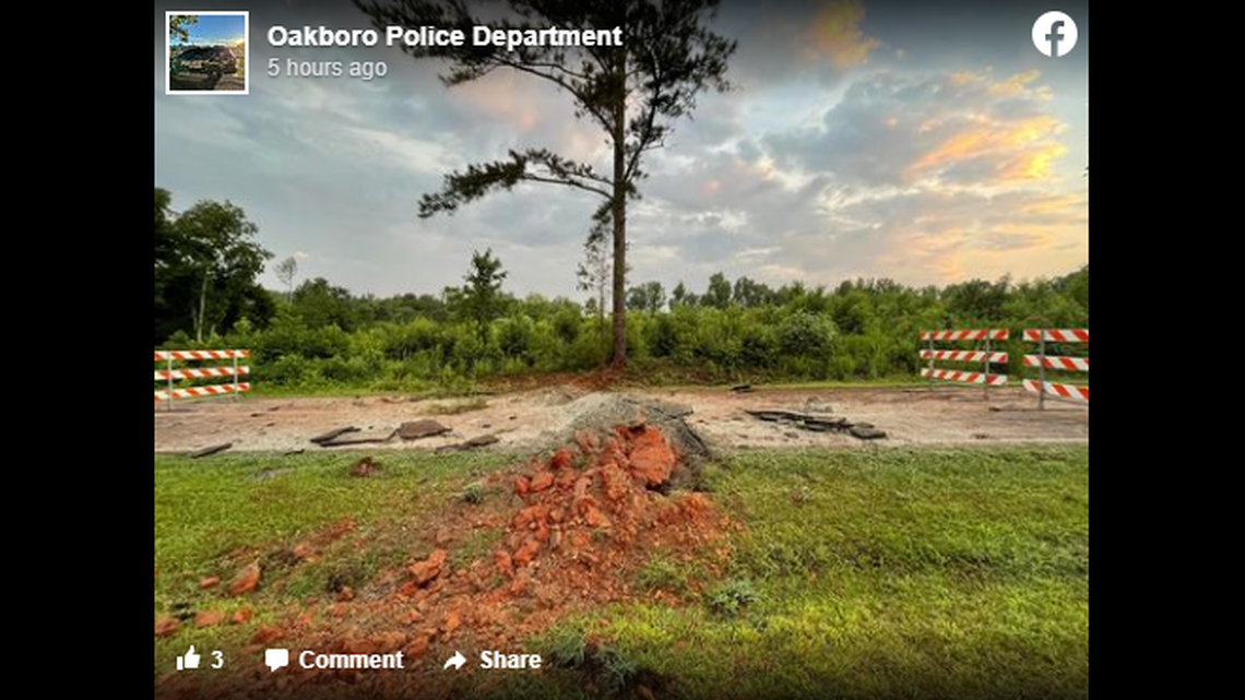 The lightning strike left a North Carolina road in disrepair.
