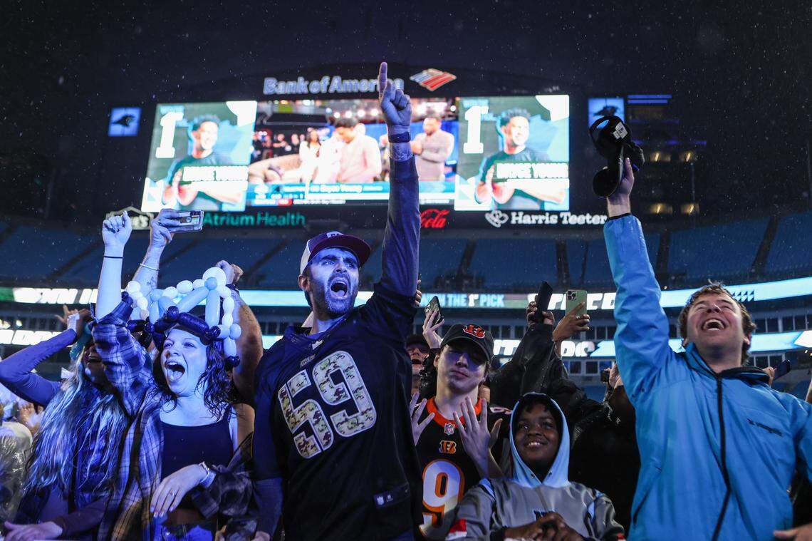 Fans react as the Panthers pick quarterback Bryce Young as the number one pick during in the NFL Draft during a fan watch party at Bank of America Stadium on Thursday, April 27, 2023.