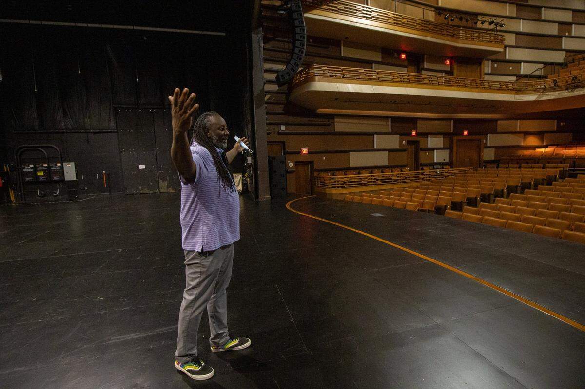 Boris “Bluz” Rogers stands on the stage at Knight Theater in uptown Charlotte. As Blumenthal Performing Arts new director of creative engagement, Rogers says he’ll work to get more marginalized voices and those of people of color on the stage.