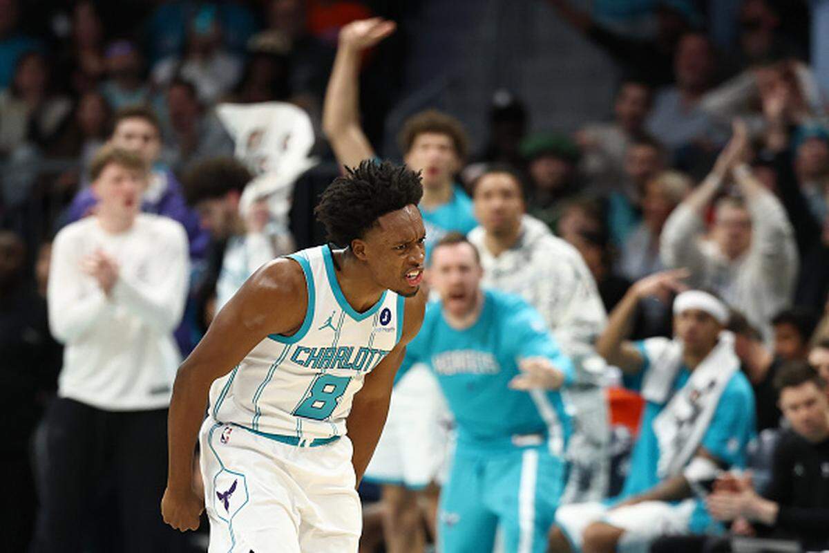Collin Sexton of the Charlotte Hornets reacts following a 3-point basket during the second quarter of the game against the Milwaukee Bucks at Spectrum Center.