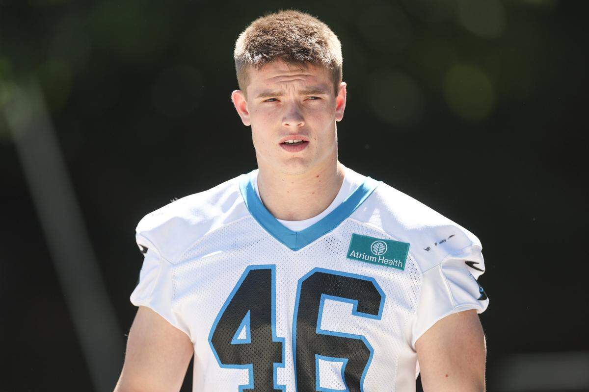 Panthers linebacker Jackson Kuwatch walks from Bank of America Stadium to the Carolina Panthers practice facility for rookie minicamp on Friday, May 8, 2026.