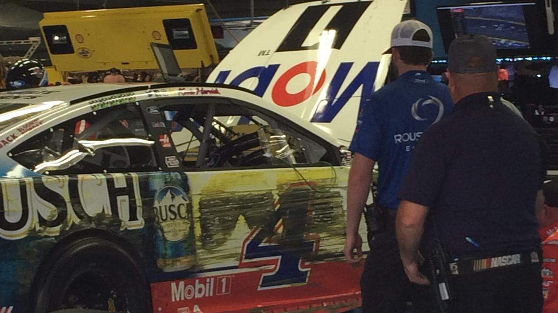 Kevin Harvick's mangled race car sits in the garage area at Charlotte Motor Speedway, leaving him with a last-place finish for the first time in his career.