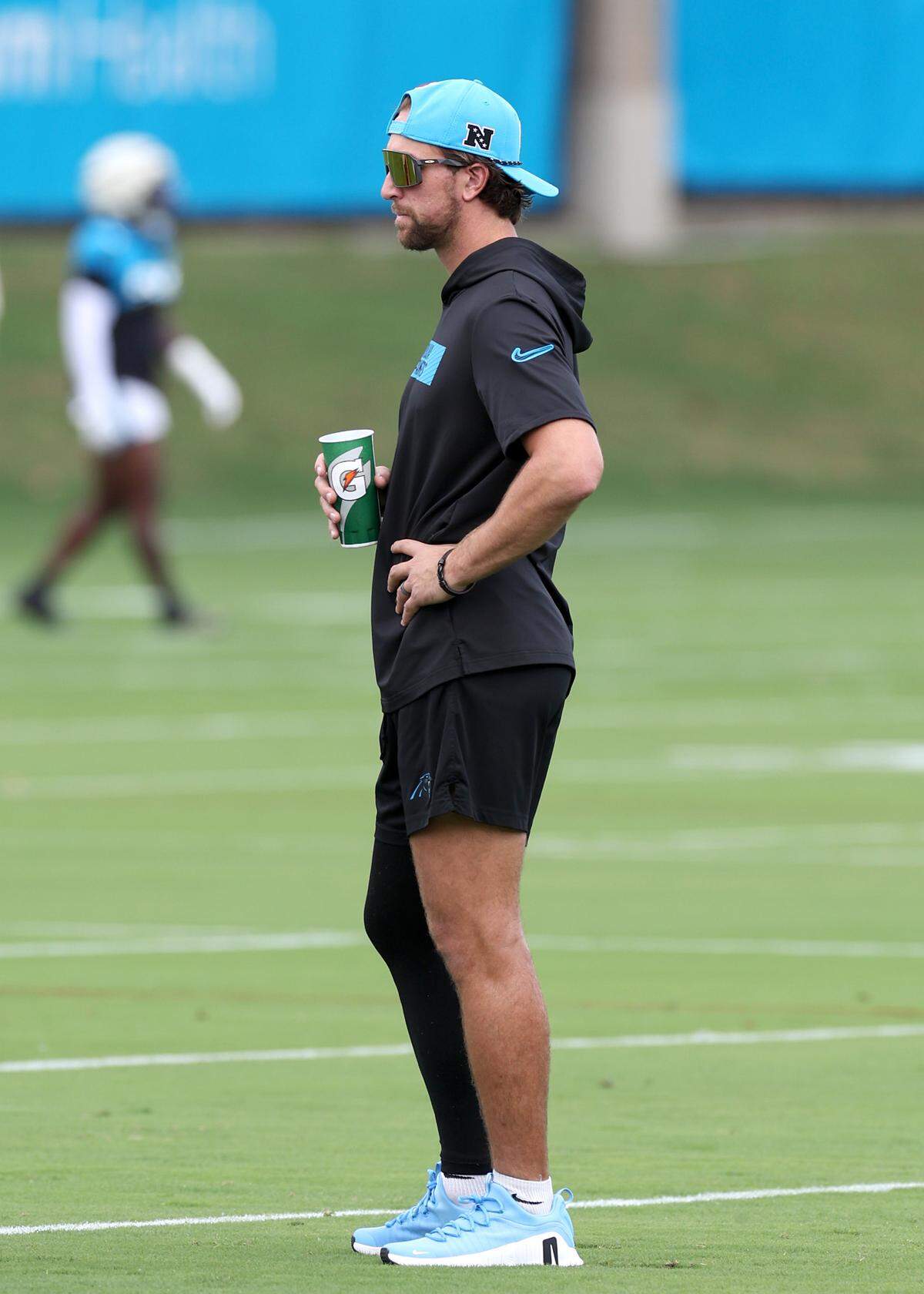 Carolina Panthers wide receiver Adam Thielen watches his teammates run through drills during practice on Wednesday, September 25, 2024. Thielen has been placed on injured reserve with a hamstring injury.