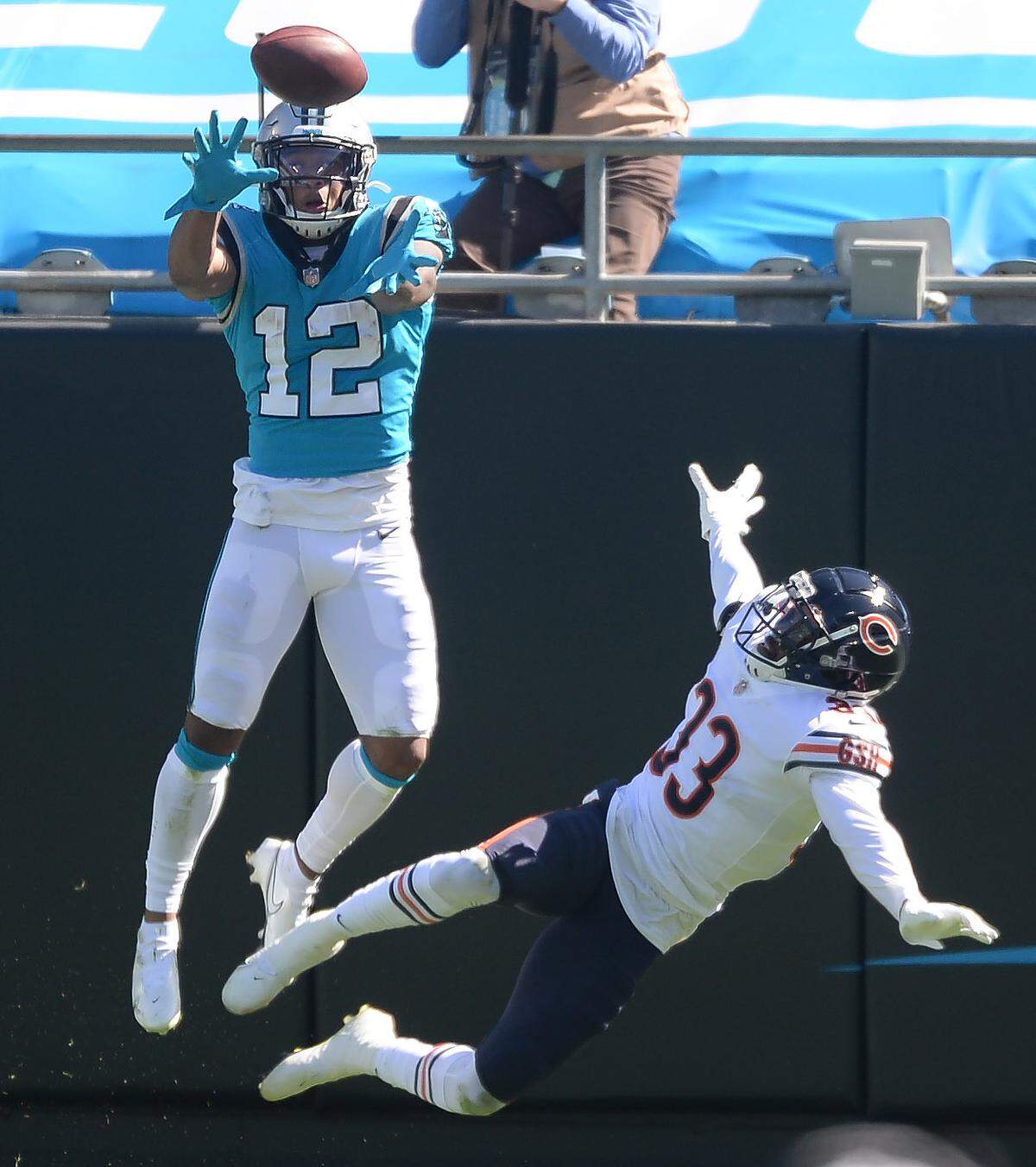 Carolina Panthers wide receiver DJ Moore (12) focuses on a throw from Teddy Bridgewater Sunday. Moore had both hands on the ball, which would have been a two-yard TD pass, but dropped it.
