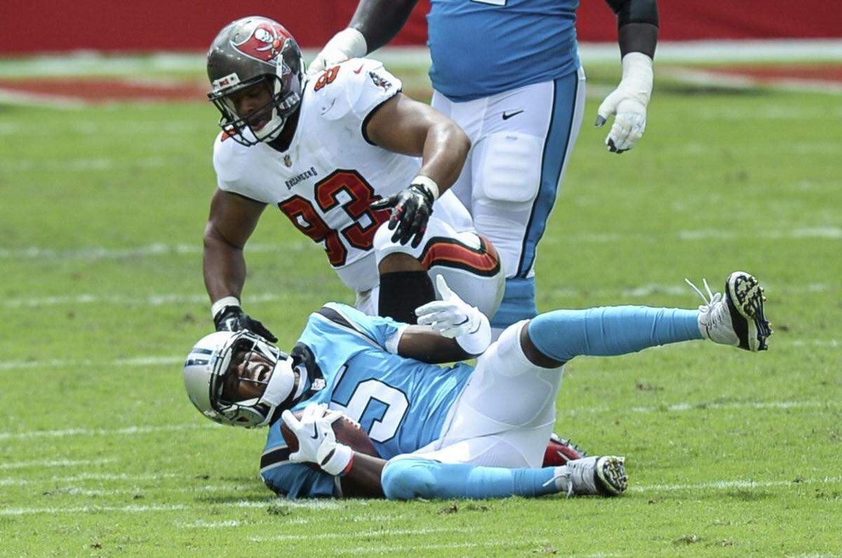 Carolina Panthers quarterback Teddy Bridgewater (5) reacts to be taken down by Tampa Bay Buccaneers nose tackle Ndamukong Suh (93) during the first quarter at Raymond James Stadium on Sunday, September 20, 2020, in Tampa Bay, Florida.
