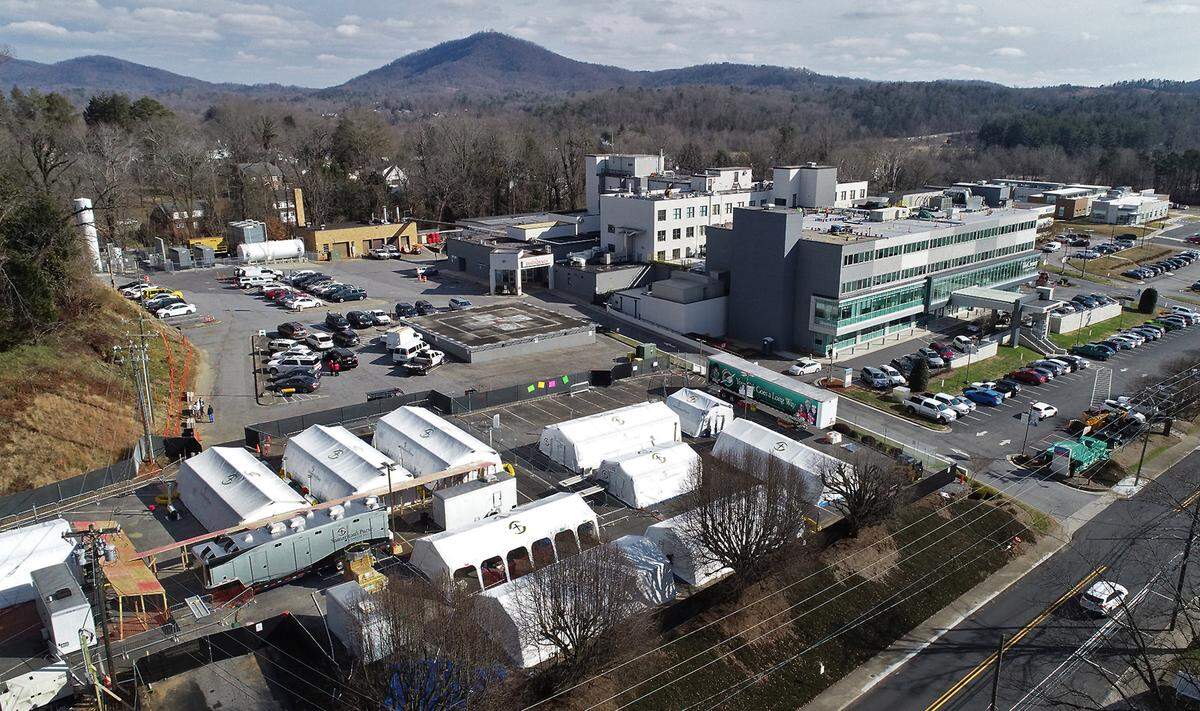 The Samaritan’s Purse emergency field hospital, lower left, sits adjacent to Caldwell Memorial Hospital on Thursday, January 7, 2020 in Lenoir, NC.