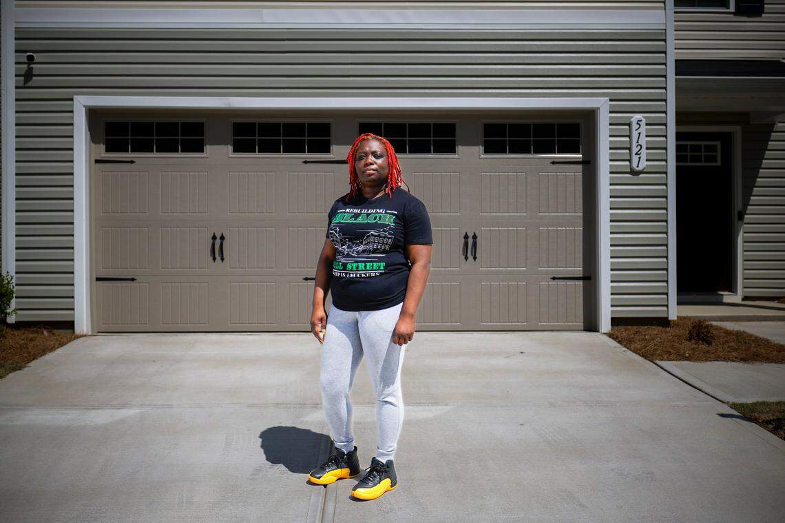 Rasheedah Harrison at her new home in Charlotte in late April. Harrison previously rented a home from Progress Residential, and filed a complaint with the NC attorney general over problems she said she had with the company.