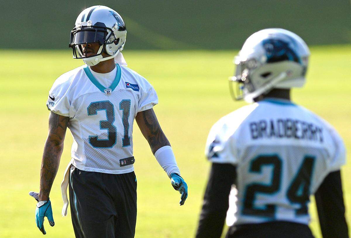 Carolina Panthers cornerback Lorenzo Doss, left, waits to resume a drill with cornerback James Bradberry, right, during minicamp on Wednesday, June 13, 2018. 