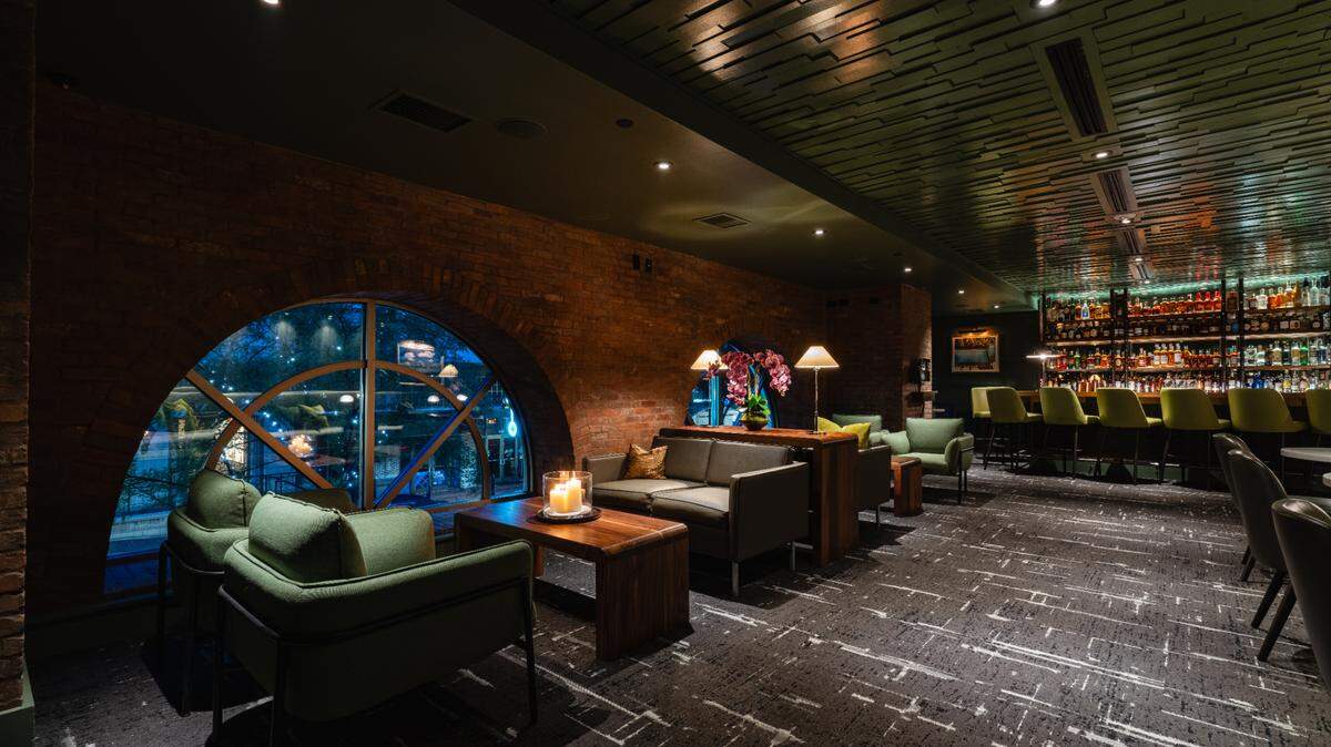 The Loft at Duckworth’s bar area is cozy with low ceilings in South Park.