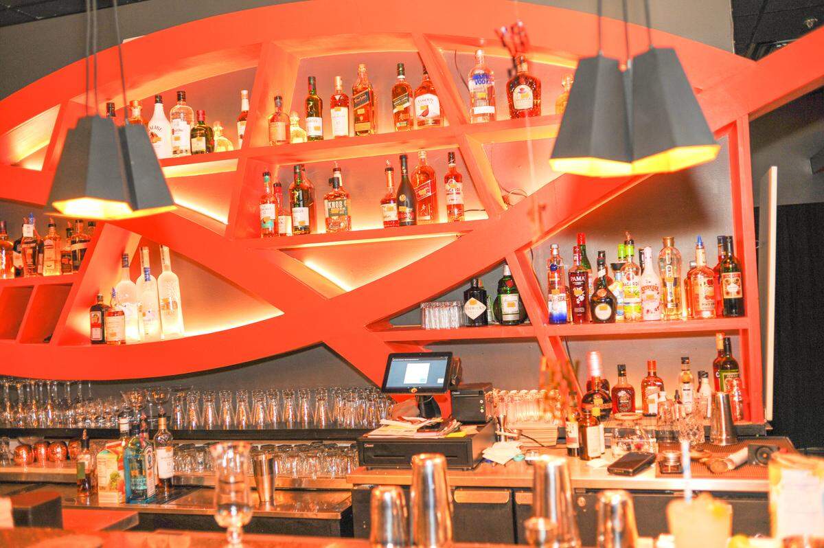 The drink menu at Exotica Indian Kitchen & Bar in uptown Charlotte includes cocktails like a Pear Martini made with vodka, elderflower liqueur, champagne top, and a pear slice, plus wine, beer and mocktails.