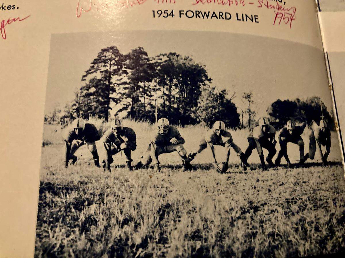 West Charlotte’s 1954 football team’s offensive line. The ’54 Lions won the school’s first state football title