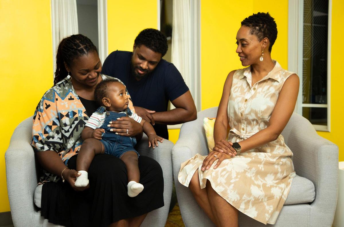 Rachel and Deron Dean, along with their baby, Jackson Dean, sit with Karen Phelps at City Cocoa B.E.A.N.S. Among its services, the organization offers nutritional counseling and breastfeeding classes for women of color.