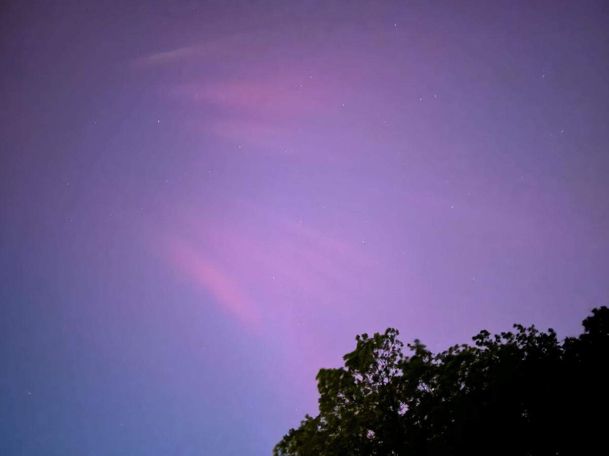 CharlotteFive editor Melissa Oyler captured this image of the northern lights late Friday, May 10, 2024, from the NoDa section of Charlotte.