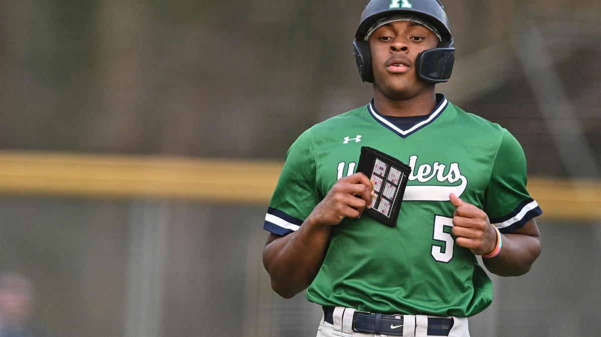 A.L. Brown pitcher C.J. Gray (5) scores a run during a varsity baseball game against East Mecklenburg, Thursday, March 13, 2024, in Charlotte, N.C. (Charlotte Observer/Matt Kelley)