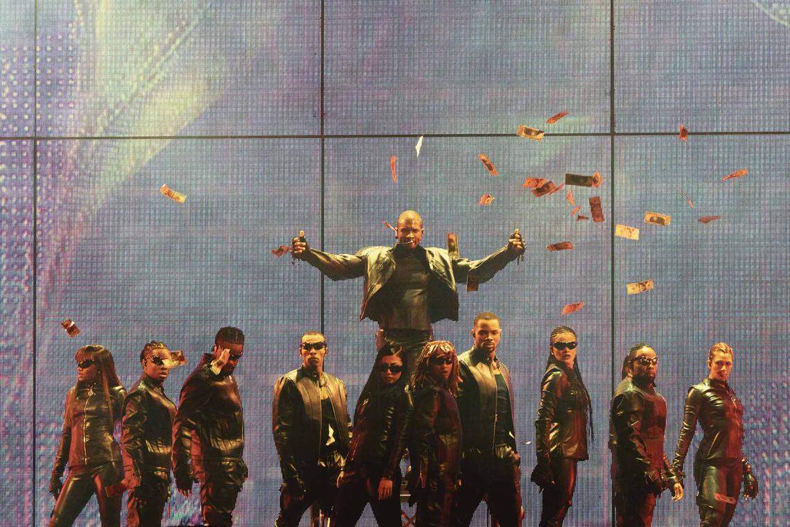 Usher performs at Spectrum Center in Charlotte on Tuesday night.