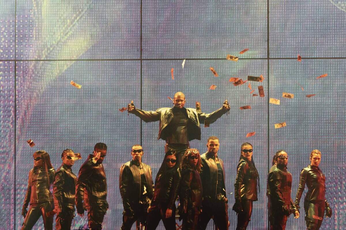 Usher performs at Spectrum Center in Charlotte on Tuesday night.