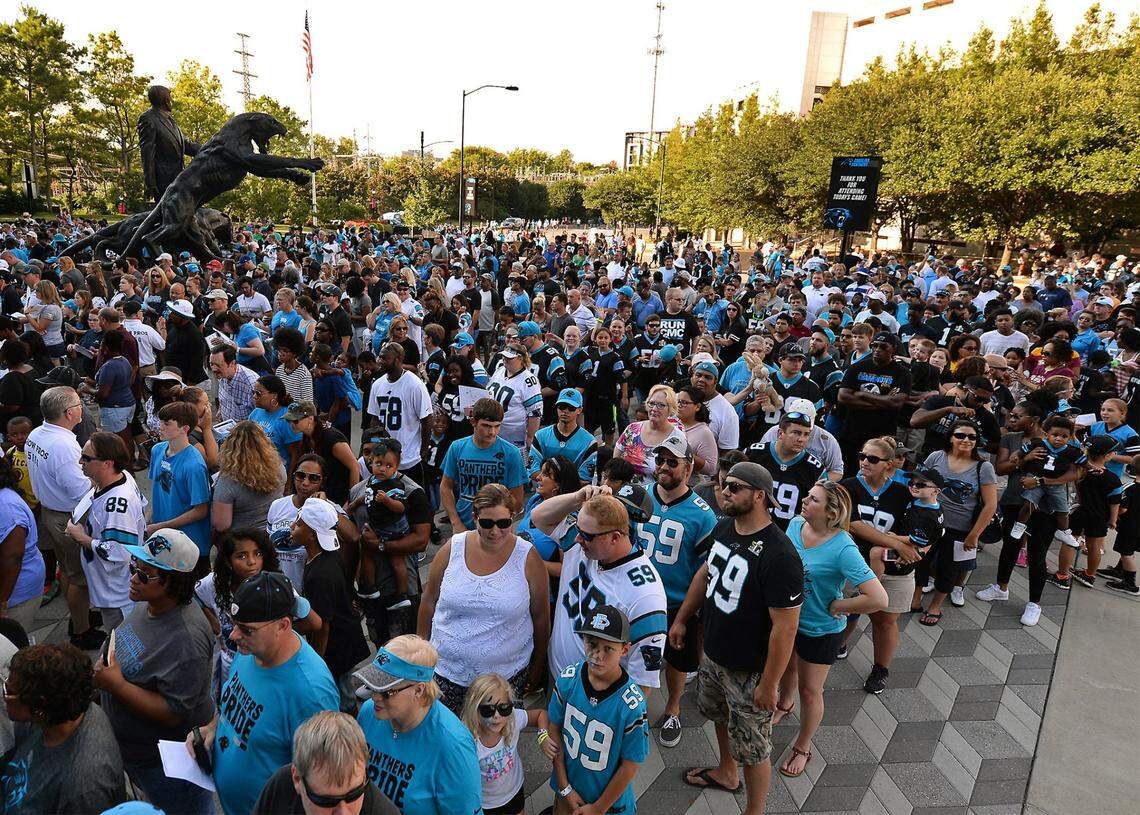 Carolina Panthers fans line up to enter Bank of America Stadium on Friday, Aug. 4, 2017, for Carolina Panthers Fan Fest. A poll by BonusFinder.com ranked Panthers fans among the ‘Least Sexiest’ in the NFL.