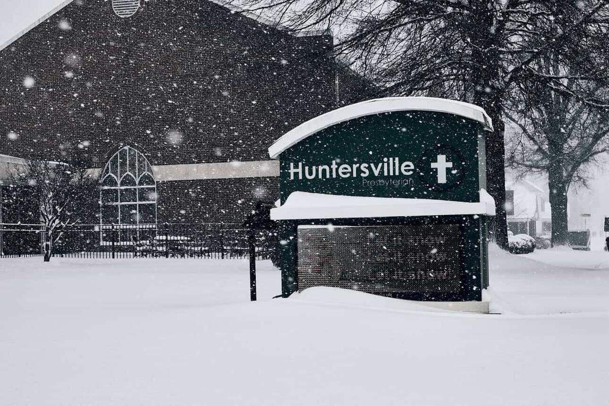 Snow falls on Huntersville Presbyterian Church in Huntersville, NC on Saturday, January 31, 2026.