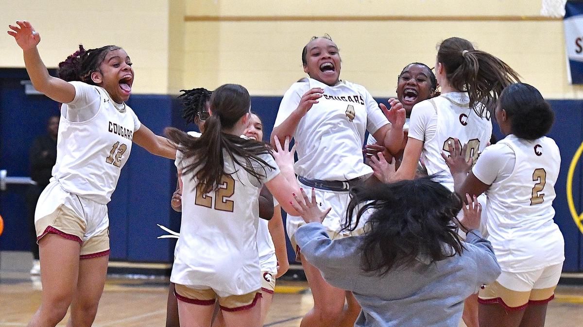 The Cannon School’s Maya McCorkle (4) and teammates celebrate after their victory over Providence Day in the NCISAA 4A Girls Basketball Championships in Raleigh N.C. The Cannon School and Providence Day School met in the NCISAA 4A Girls Finals in Raleigh, N.C. on February 24, 2024.