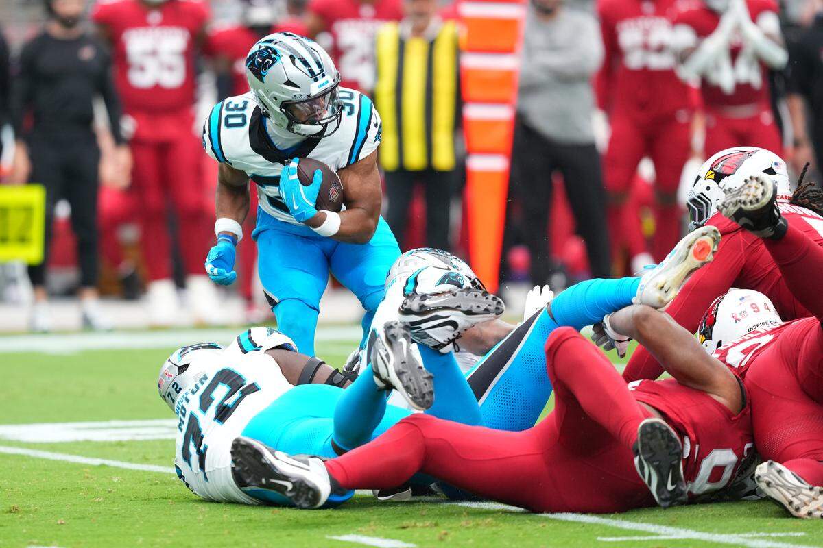 Carolina Panthers running back Chuba Hubbard (30) runs the ball during the first quarter against the Arizona Cardinals at State Farm Stadium in Glendale, AZ on Sunday, Sept. 14, 2025