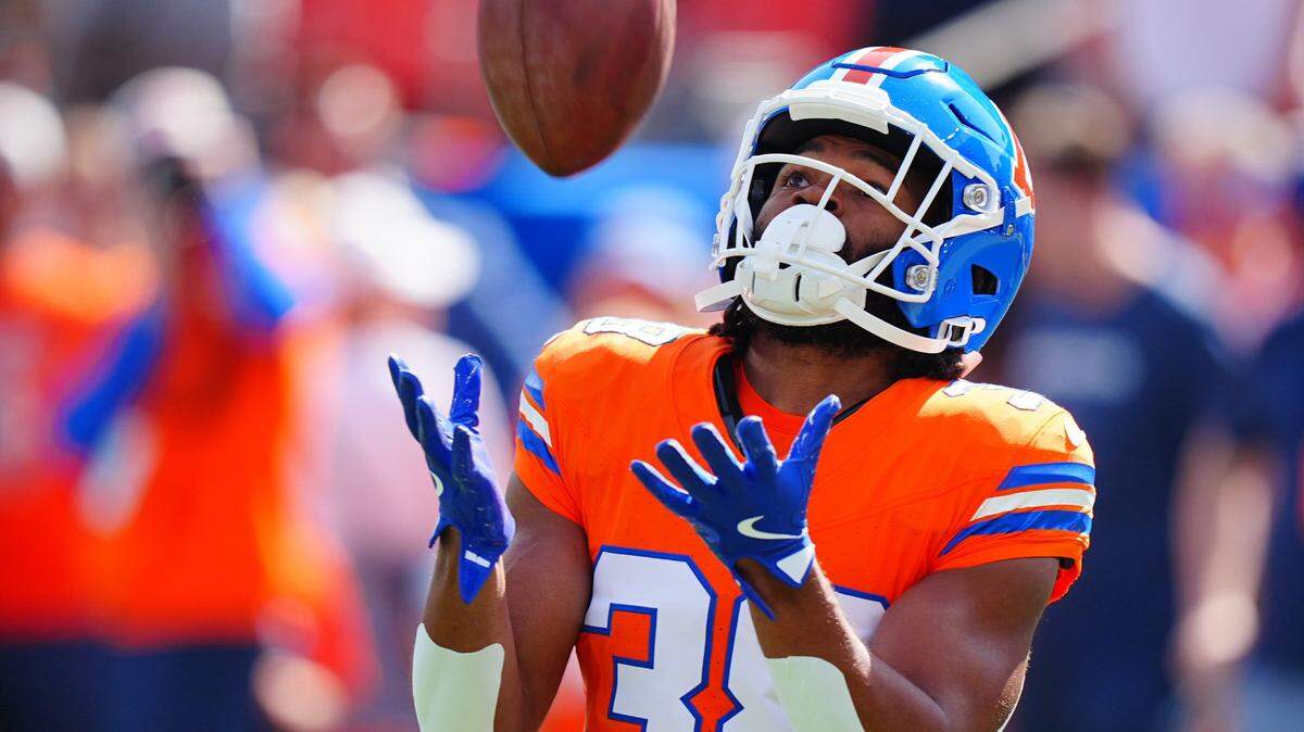 Oct 6, 2024; Denver, Colorado, USA; Denver Broncos running back Jaleel McLaughlin (38) warms up before the game against the Las Vegas Raiders at Empower Field at Mile High. Mandatory Credit: Ron Chenoy-Imagn Images