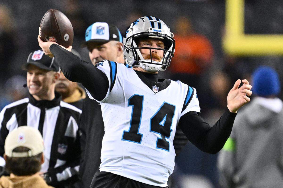 Nov 9, 2023; Chicago, Illinois, USA; Carolina Panthers quarterback Andy Dalton (14) warms up before a game against the Chicago Bears at Soldier Field. Mandatory Credit: Jamie Sabau-USA TODAY Sports