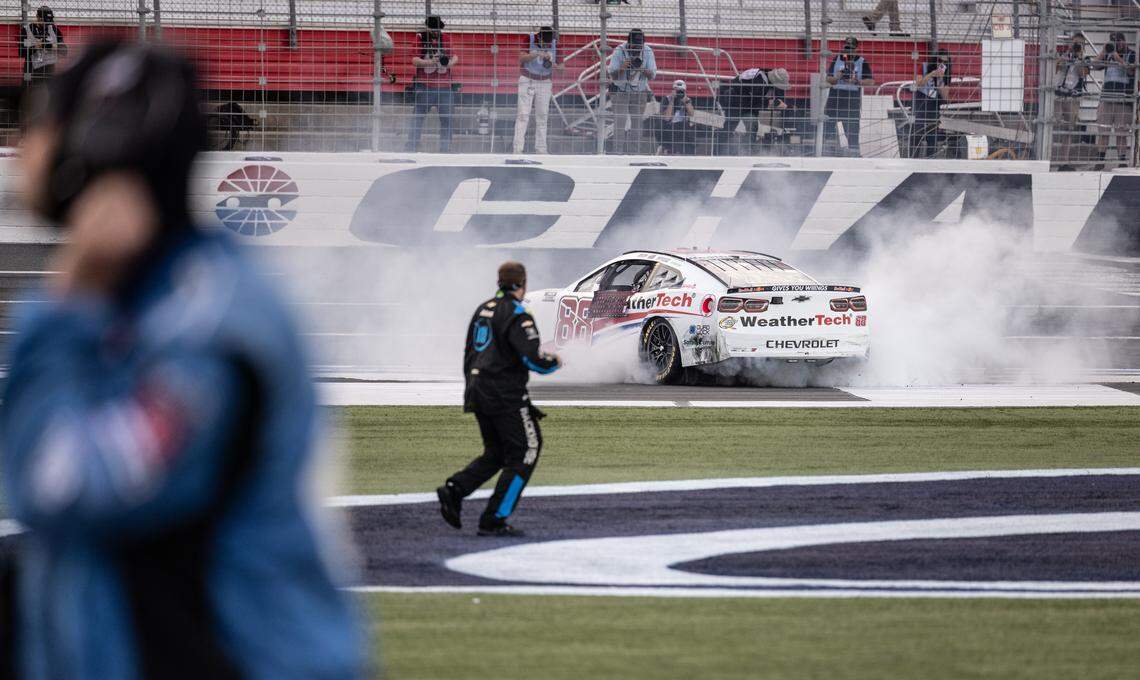 NASCAR Cup Series driver Shane van Gisbergen (88) celebrates winning the Bank of America Roval 400 with a burnout on Sunday, Oct. 5, 2025, at Charlotte Motor Speedway.