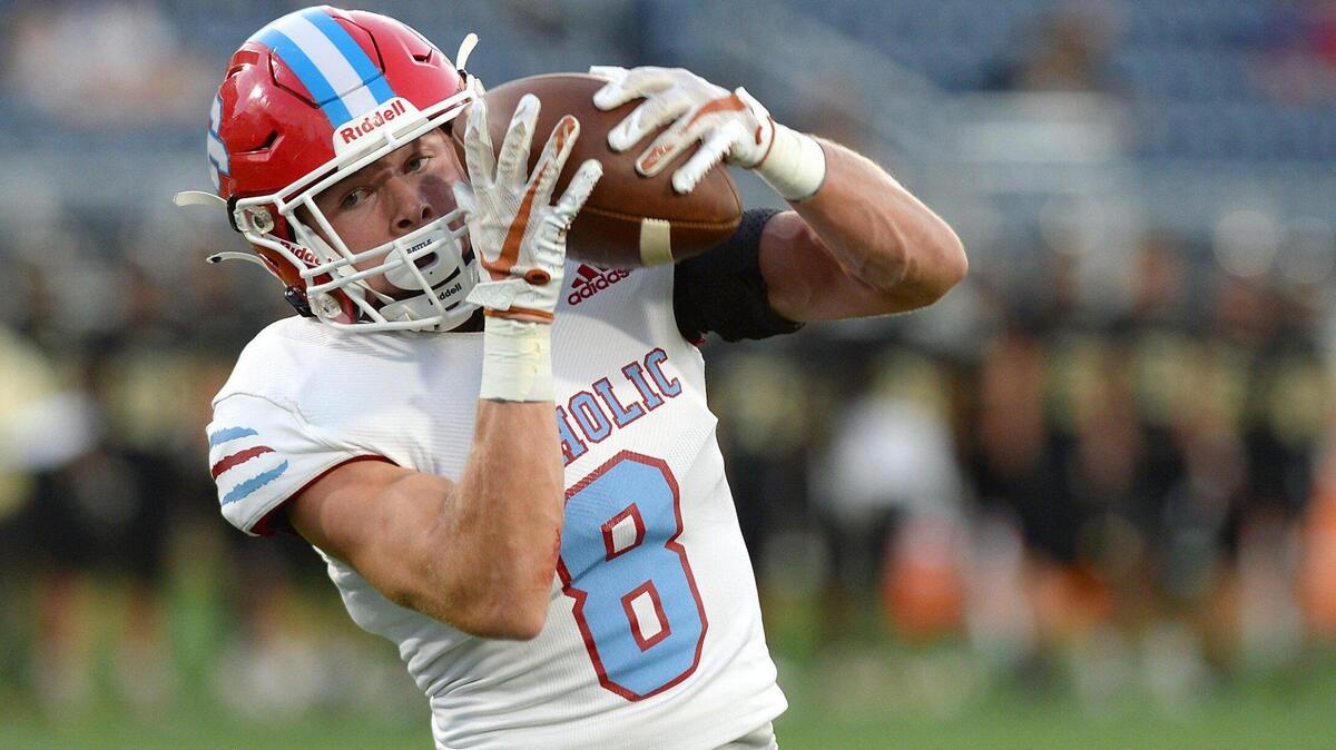 Charlotte Catholic wide receiver Jacob Deller catches a touchdown pass during first quarter action against Providence High on Friday, September 17, 2021 at Memorial Stadium in Charlotte, NC.