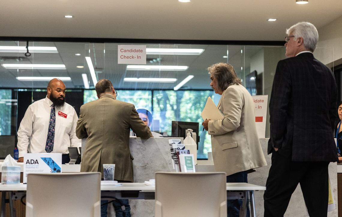 Candidates sign up to run for office during the first day of candidate filing for the 2025 election.