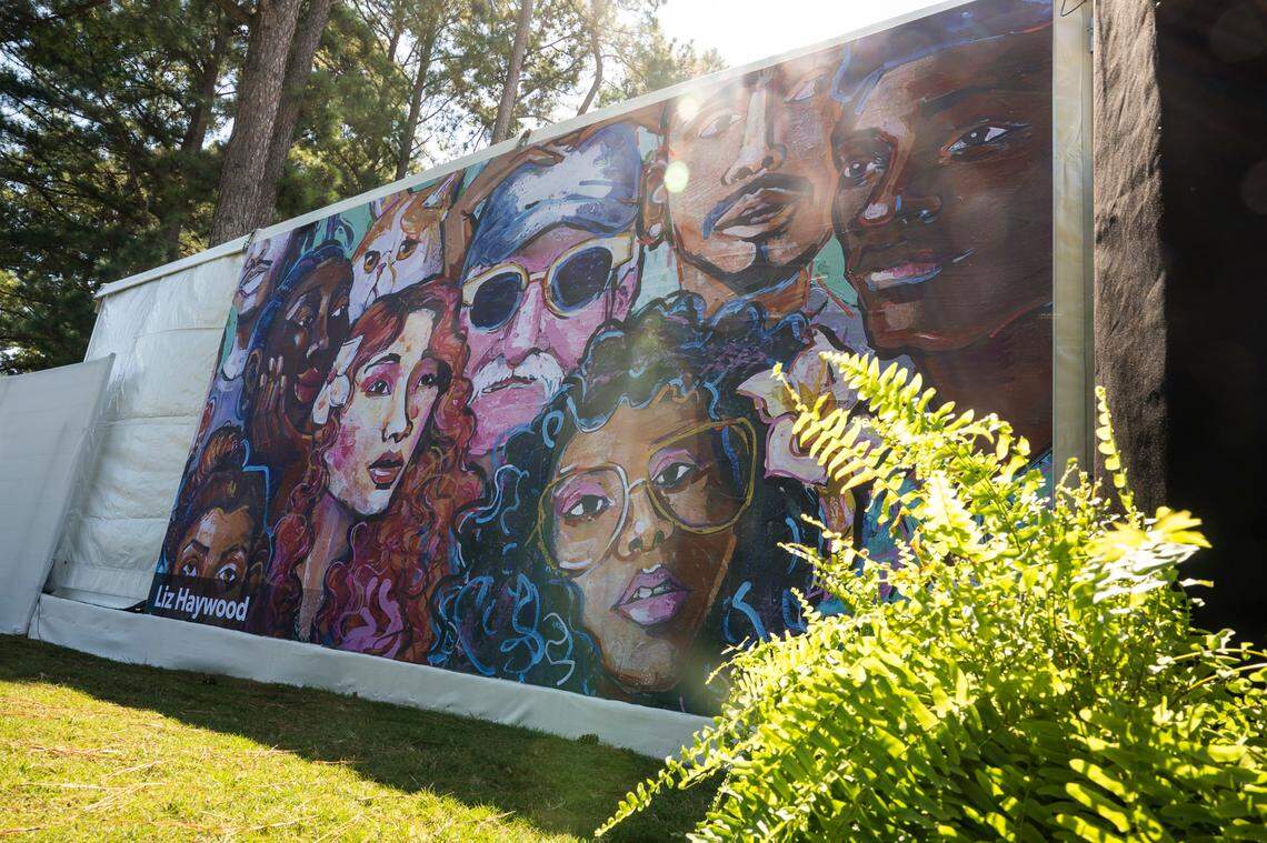 A mural by artist Liz Haywood is on display at the Presidents Cup at Quail Hollow Club on Thursday, September 22, 2022 in Charlotte, NC. Haywood drew inspiration for this particular piece from a song “The World is a Rainbow”, that was sung in Mr. Hill’s class at Dilworth Elementary School, and in particular the lyrics “It takes all kinds of people to make the world go ‘round.”
