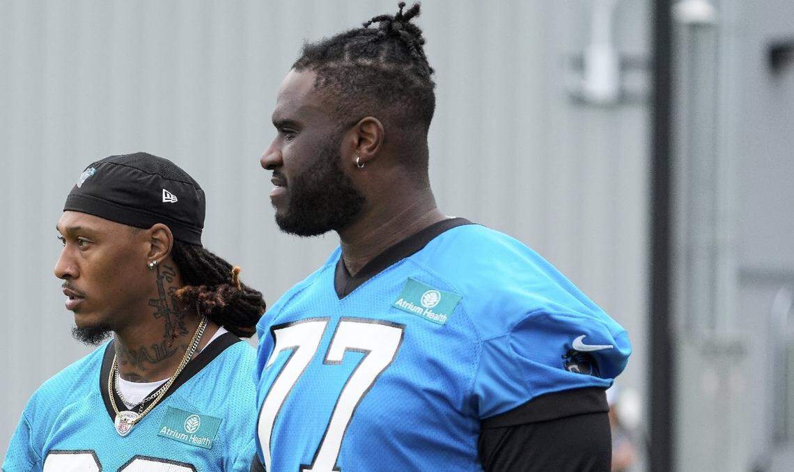 Jul 30, 2024; Charlotte, NC, USA; Carolina Panthers wide receiver Devin Carter (36) and offensive tackle Yosh Nijman (77) during training camp at Carolina Panthers Practice Fields. Mandatory Credit: Jim Dedmon-USA TODAY Sports