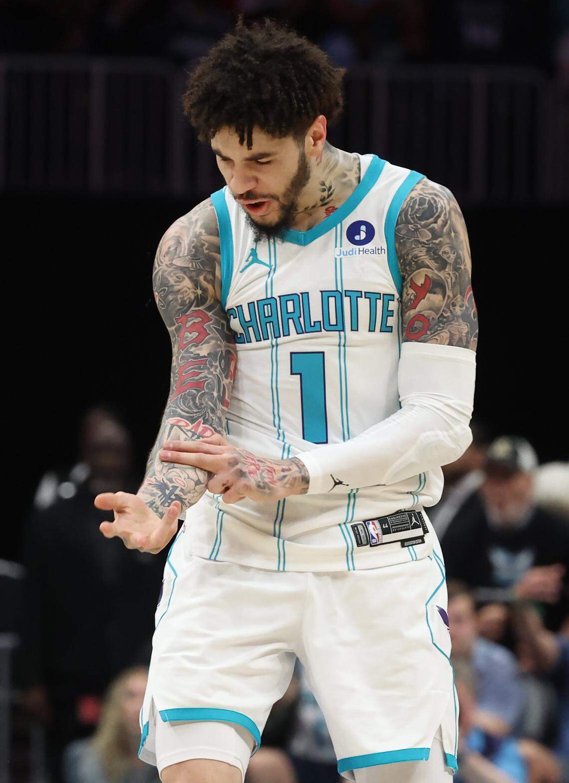 Charlotte Hornets guard LaMelo Ball celebrates a three-point basket against the Miami Heat at Spectrum Center in Charlotte, NC on Tuesday, April 14, 2026. The Hornets host the Miami Heat in NBA Play-in-Tournament basketball game.