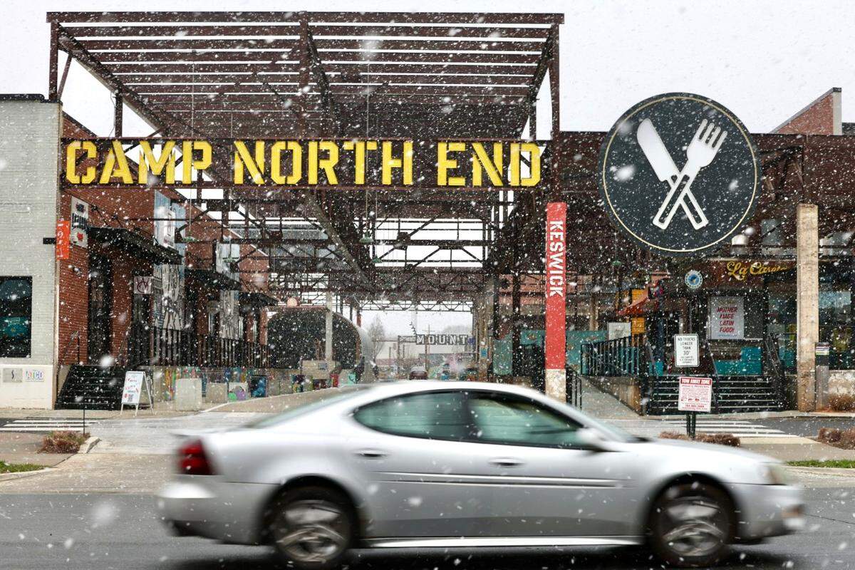 Snow starts to fall at Camp North End in Charlotte on Wednesday, Feb. 19, 2025.