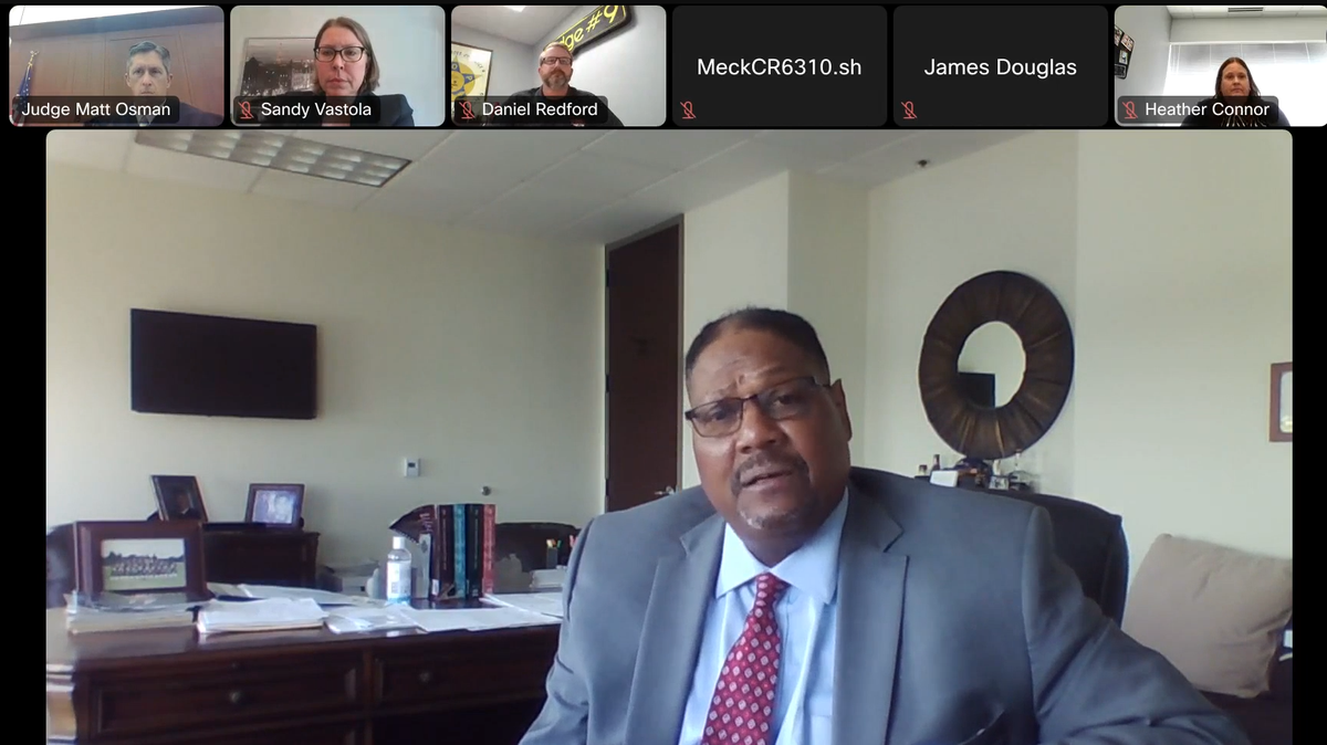 CMPD Director of Public Affairs Sandra Vastola sued the Charlotte-Mecklenburg Fraternal Order of Police and its president, Daniel Redford, for defamation, but a judge dismissed the case in April. In this image from the hearing, her attorney, James E. Hairston Jr., addresses the court.