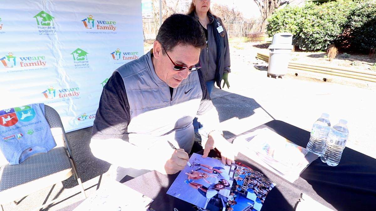 In Feb. 2020, Ron Rivera signed a photo from a CharlotteFive interview in 2019. The Humane Society of Charlotte and Ron and Stephanie Rivera were hosting a yard sale, with the proceeds going toward the Humane Society’s capital campaign to build a new facility.