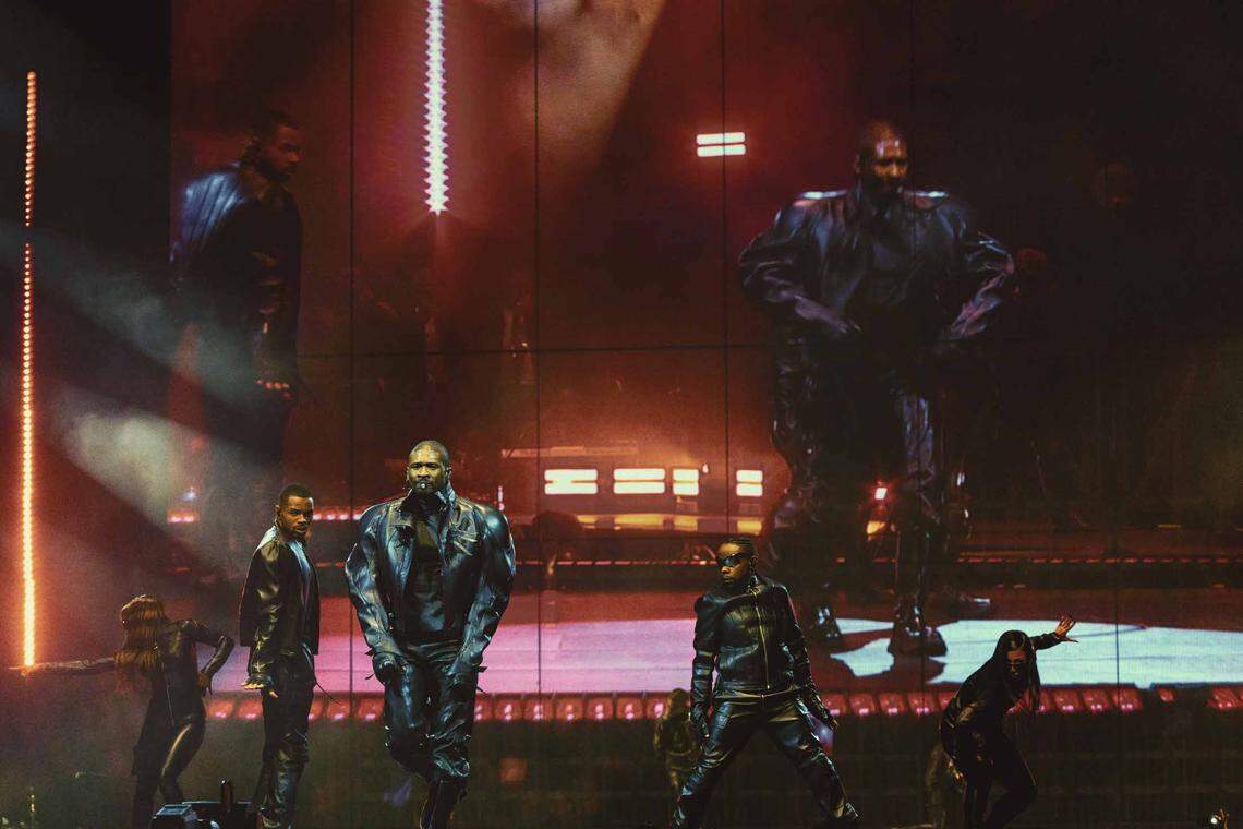 Usher performs at Spectrum Center in Charlotte on Tuesday night.