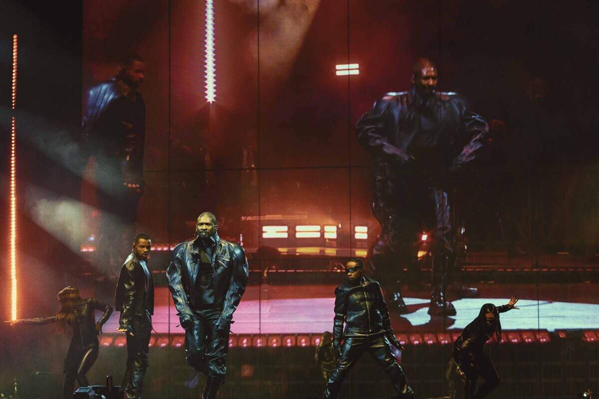 Usher performs at Spectrum Center in Charlotte on Tuesday night.