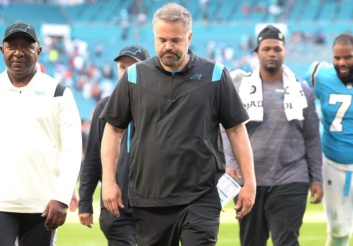 Carolina Panthers head coach Matt Rhule walks off the field following the team’s 33-10 loss to the Miami Dolphins at Hard Rock Stadium in Miami Gardens, Fla. on Sunday.