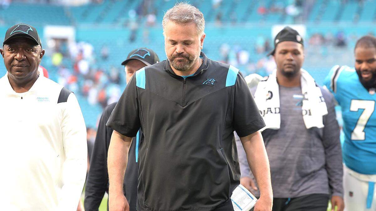 Carolina Panthers head coach Matt Rhule walks off the field following the team’s 33-10 loss to the Miami Dolphins at Hard Rock Stadium in Miami Gardens, Fla. on Sunday. Rhule will have tough decisions to make soon about his staff, including offensive coordinator Joe Brady.